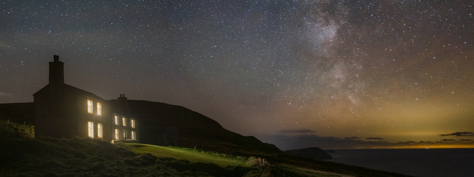 Eary Cushlin at night time, under a starry sky on the Isle of Man
