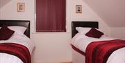 The 1st Floor Twin / Double room - shown as a Twin - can be configured as a Double (Super King Size Bed).