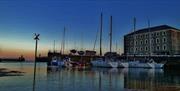 Laxey Harbour  with yachts and fishing boats.