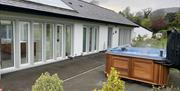 Walk straight from the luxury bathroom to your personal hot tub
