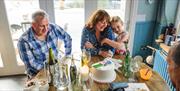 Family sat at a table