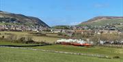 Victorian steam train running between Port Erin and Douglas