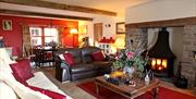 Private guest sitting room where our delicious Manx breakfast is served and you can enjoy evenings by the fire