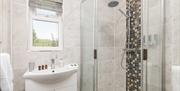 Family bathroom, walk in shower and separate bath. Luxury Swedish organic toiletries.